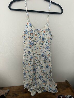 Ci Sono Cream Romper with Blue & Orange Floral Print Womens size Medium